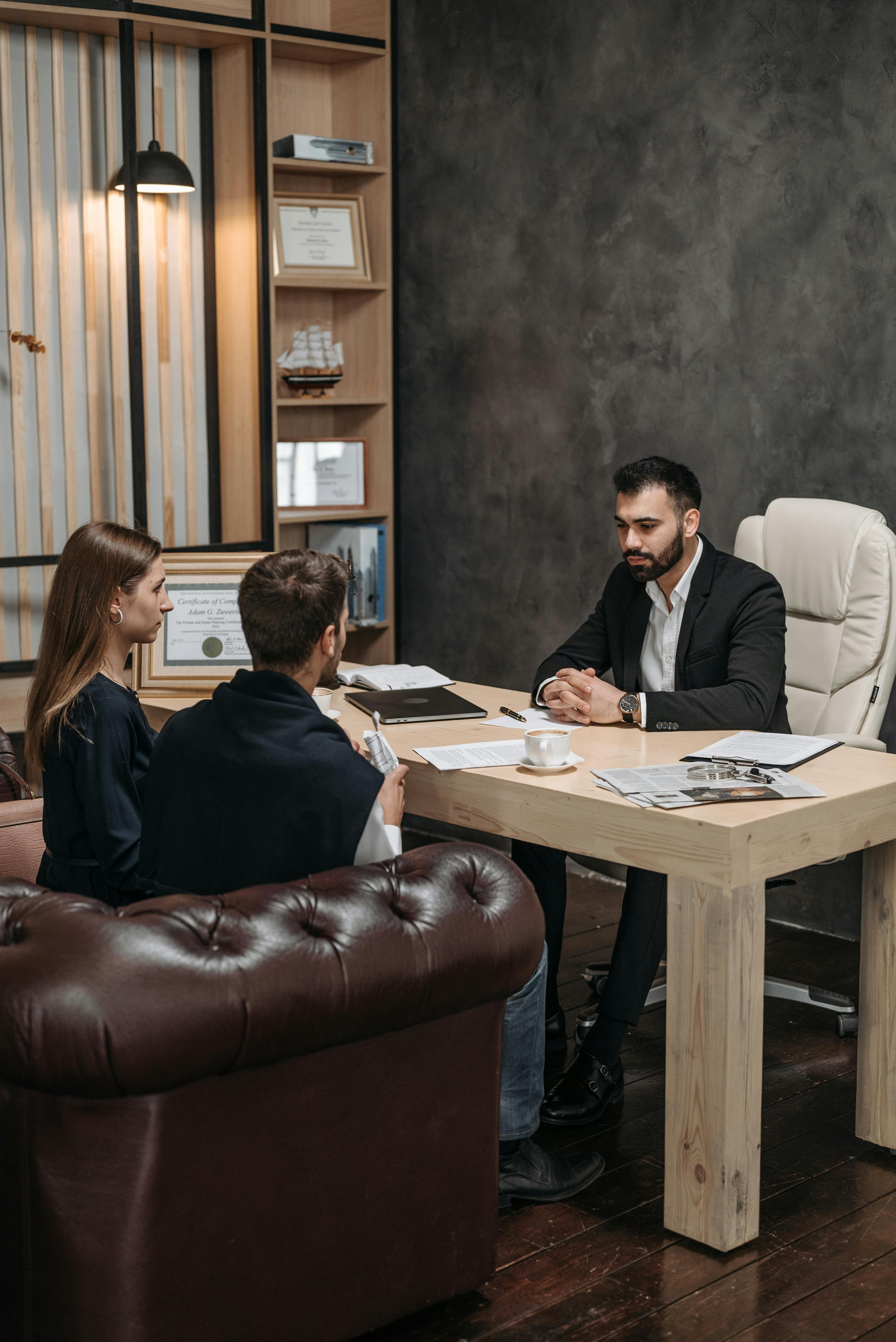 Financial advisor reviewing a plan report with a client