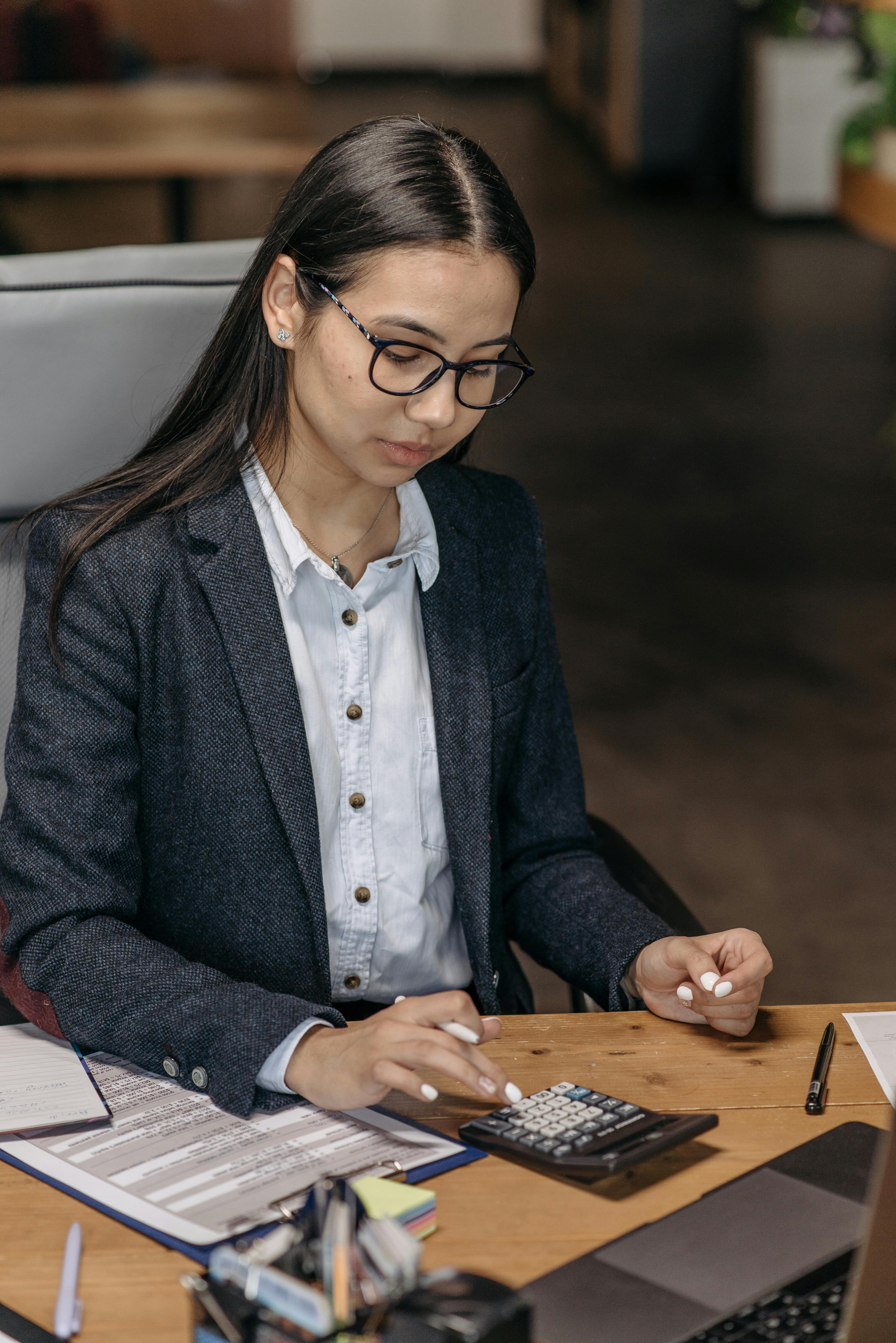 CPA and retirement plan specialist reviewing client documents